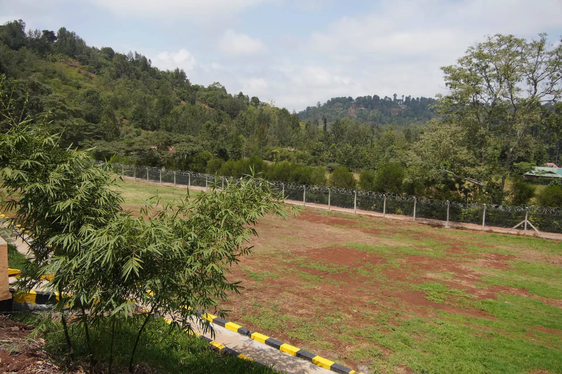 A wide hillside view of the ARS grounds and surrounding Nyeri landscape.